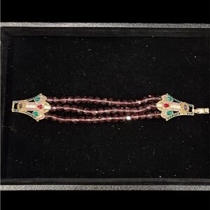 Heidi Daus Elegant Gold and Purple Beaded Bracelet